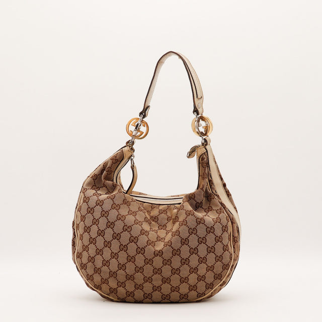 Vue de face Gucci Hobo Interlocking G toile monogrammée beige occasion authentique — AMANA Vintage