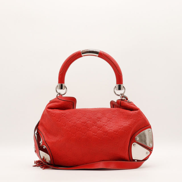 Détail du fermoir à tourniquet Gucci Indy Hobo cuir Guccissima rouge occasion authentique — AMANA Vintage