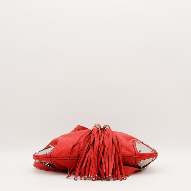 Intérieur du sac Gucci Indy Hobo cuir Guccissima rouge occasion authentique — AMANA Vintage