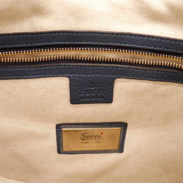 Intérieur doublure toile beige et plaque Gucci made in Italy — AMANA Vintage