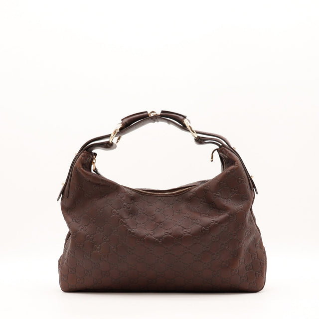 Détail du mors doré Gucci Hobo Horsebit cuir Guccissima marron occasion authentique — AMANA Vintage