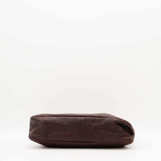 Détail de l'anse Gucci Hobo Horsebit cuir Guccissima marron occasion authentique — AMANA Vintage
