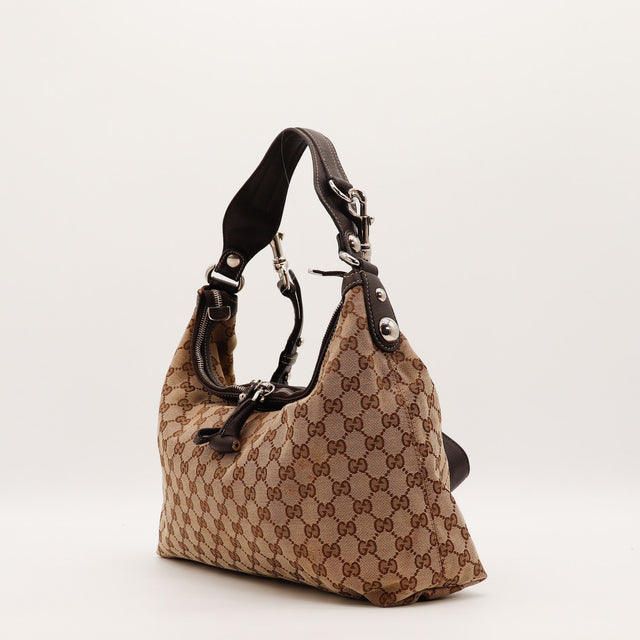 Vue de dos Gucci Hobo toile monogrammée beige et ébène occasion authentique — AMANA Vintage