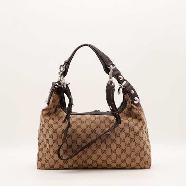 Détail de l'anse en cuir marron Gucci Hobo occasion authentique — AMANA Vintage