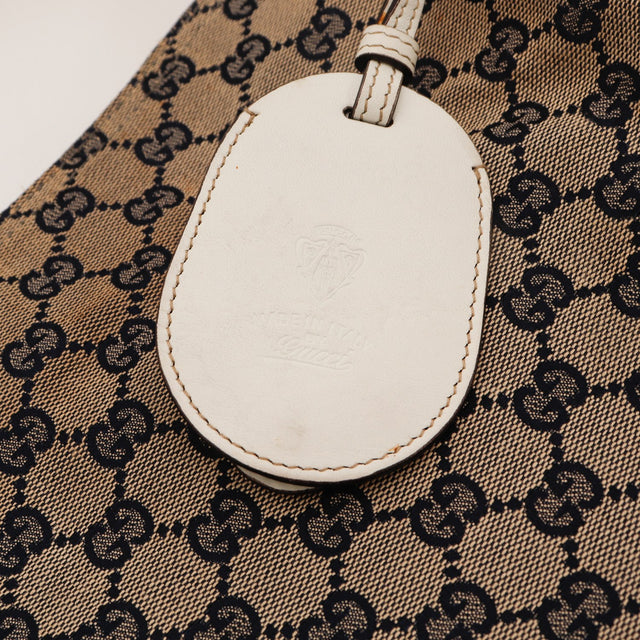 Détail breloque cuir blanc estampillée Gucci Hobo Web — AMANA Vintage