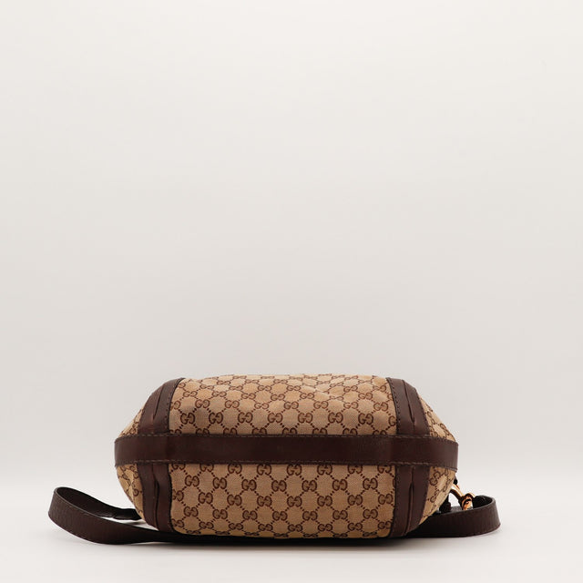 Vue de profil Gucci Hobo toile monogrammée occasion authentique — AMANA Vintage