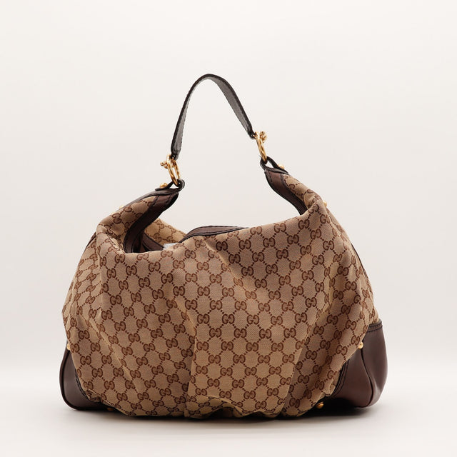 Sac Gucci Hobo Horsebit toile monogrammée vue de profil occasion authentique — AMANA Vintage