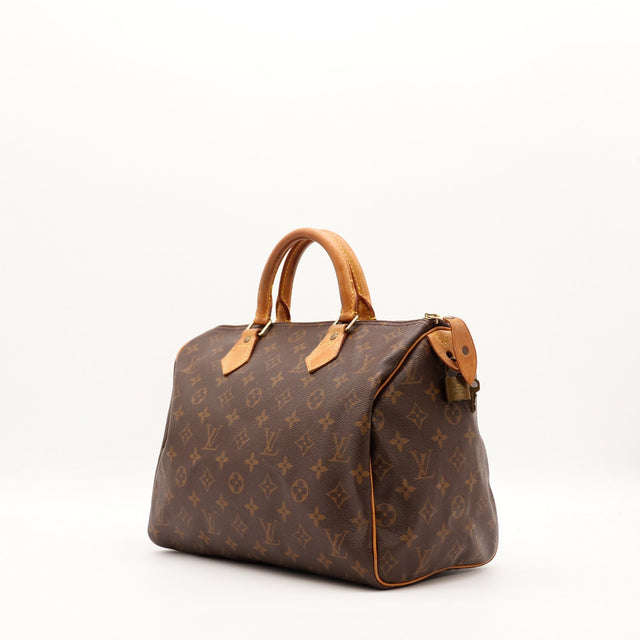 Louis Vuitton Speedy 30 vue de trois quarts toile Monogram patine caramel — AMANA Vintage