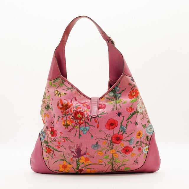 Vue de profil Gucci New Jackie toile Flora rose occasion authentique — AMANA Vintage