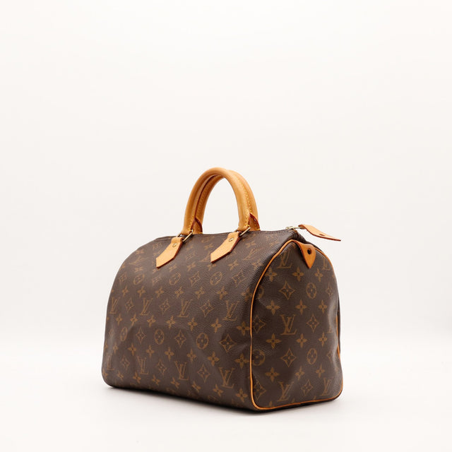 Louis Vuitton Speedy 30 vue de trois quarts patine caramel occasion — AMANA Vintage