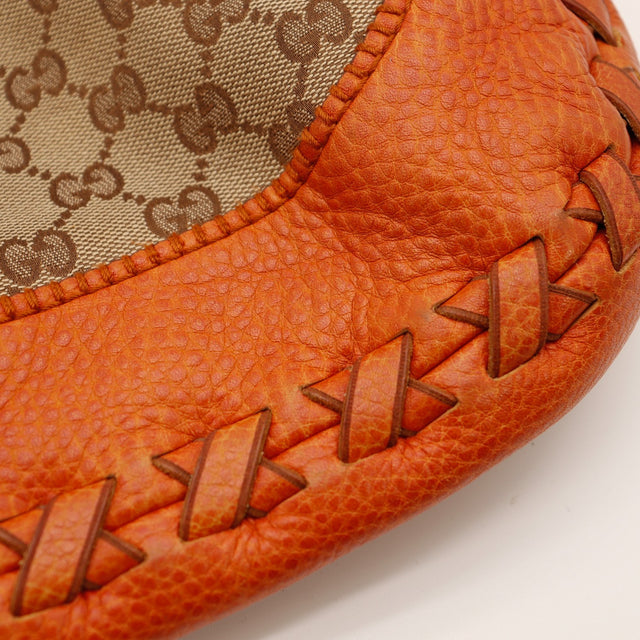 Détail cuir grainé orange surpiqué Gucci New Jackie occasion authentique — AMANA Vintage