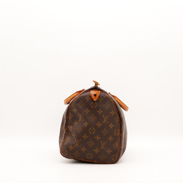 Vue latérale gauche Louis Vuitton Speedy 35 profil cuir vachette — AMANA Vintage