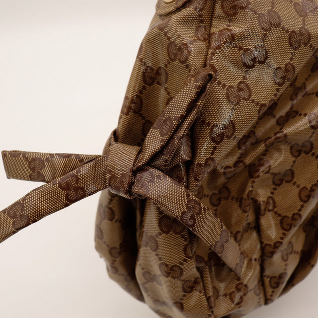 Détail nœud latéral toile monogrammée Gucci Hobo Web occasion authentique — AMANA Vintage
