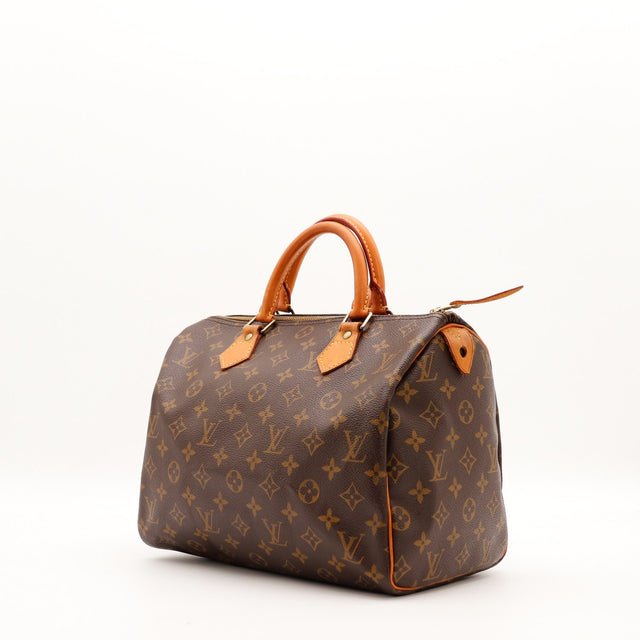 Vue trois quarts Louis Vuitton Speedy 30 toile monogrammée anses vachette caramel — AMANA Vintage