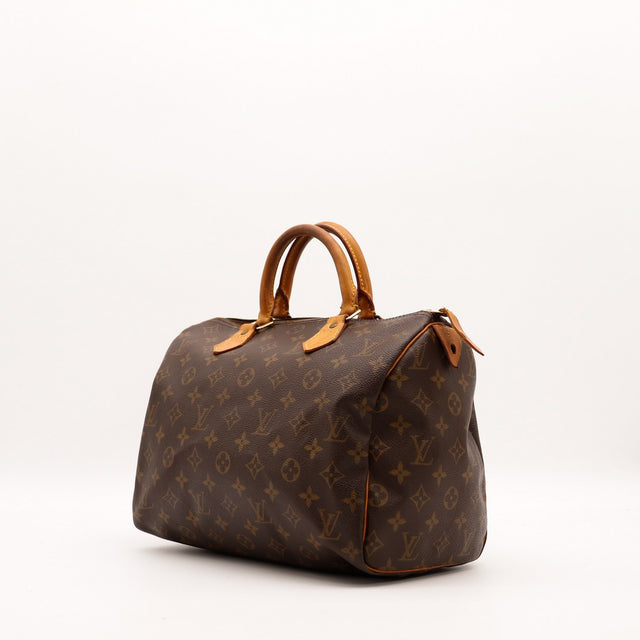 Vue trois quarts Louis Vuitton Speedy 30 toile Monogram patine caramel — AMANA Vintage