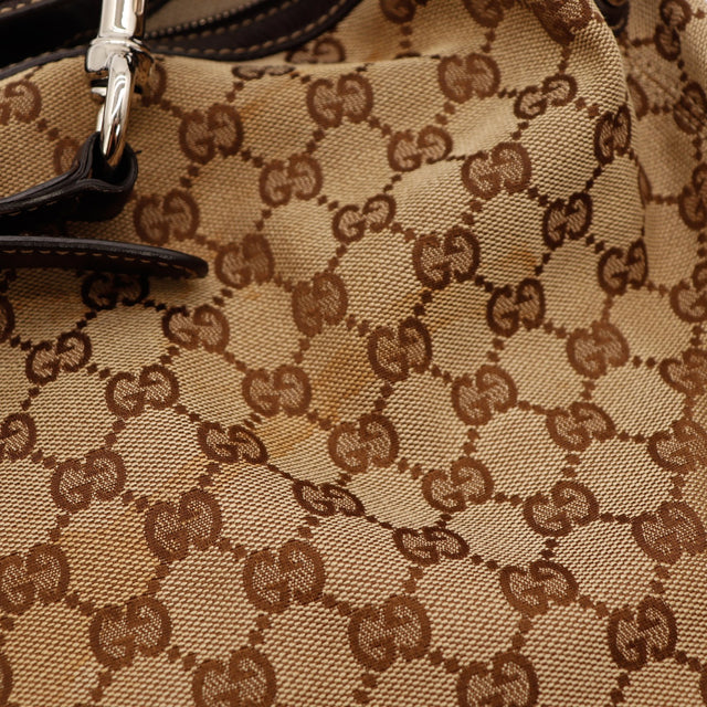 Détail toile monogrammée Gucci Hobo légères marques — AMANA Vintage