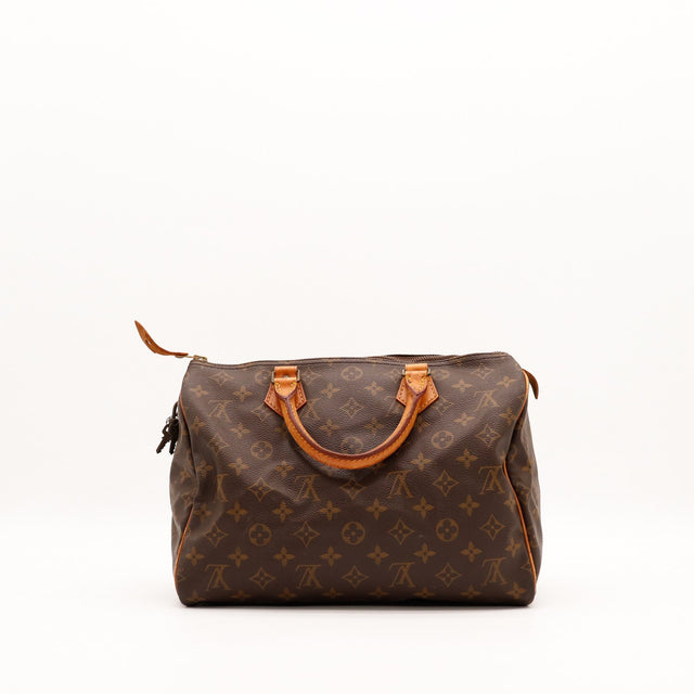 Louis Vuitton Speedy 30 vue de face deuxième angle patine caramel — AMANA Vintage