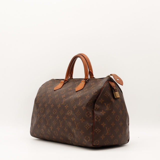 Louis Vuitton Speedy 35 vue de trois quarts avec cadenas occasion authentique — AMANA Vintage