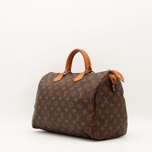 Louis Vuitton Speedy 30 anses cuir vachette patiné vue de trois quarts — AMANA Vintage