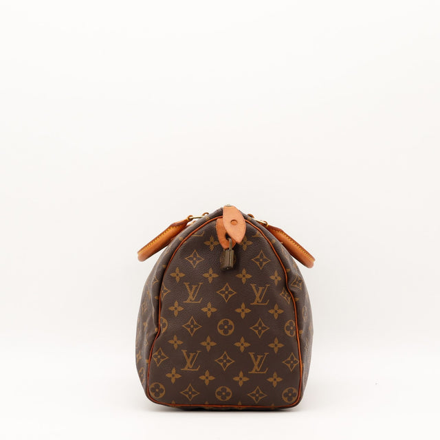 Détail latéral Louis Vuitton Speedy 30 avec cadenas toile Monogram — AMANA Vintage