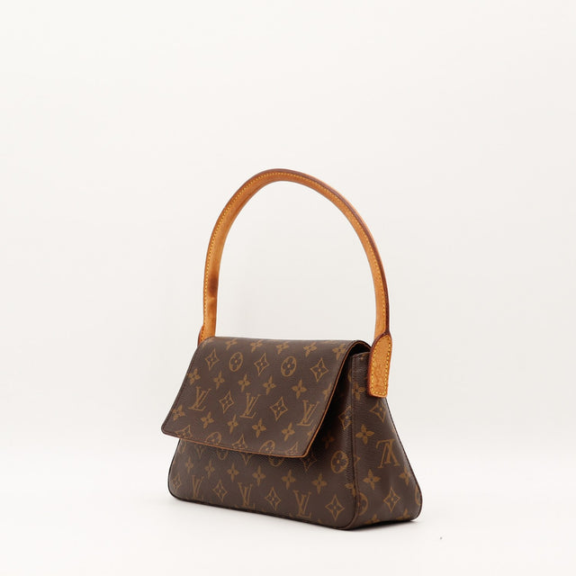 Sac Louis Vuitton Mini Looping vue trois quarts anse vachette patinée — AMANA Vintage