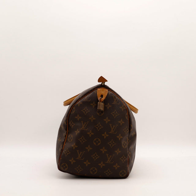 Louis Vuitton Speedy 40 vue de profil droit languette cadenas — AMANA Vintage