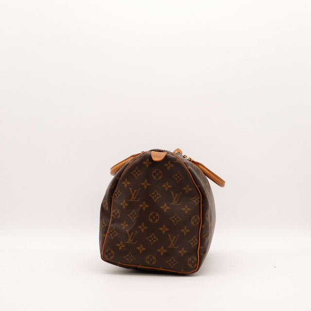 Vue latérale gauche Louis Vuitton Speedy 35 toile Monogram — AMANA Vintage
