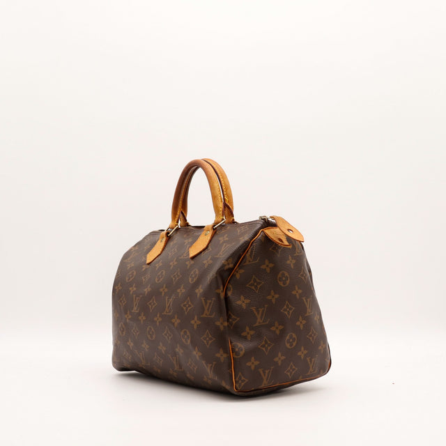 Louis Vuitton Speedy 30 vue de trois quarts gauche Toile Monogram patine caramel — AMANA Vintage