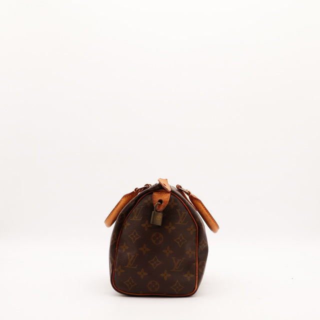 Vue de profil Louis Vuitton Speedy 25 Monogram cadenas inclus — AMANA Vintage