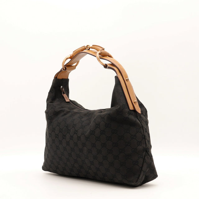 Sac Gucci Hobo Horsebit anse cuir mors doré vue de trois quarts occasion authentique — AMANA Vintage