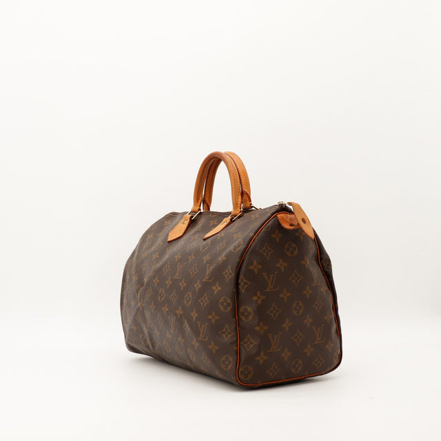Louis Vuitton Speedy 35 vue trois quarts toile Monogram patine caramel — AMANA Vintage