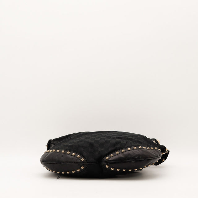 Détail base cloutée du sac Gucci Hobo occasion authentique — AMANA Vintage