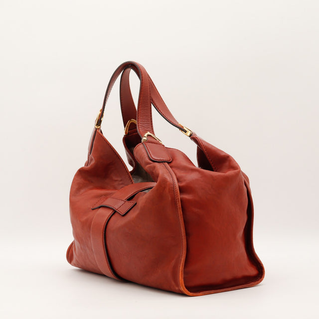 Sac Gucci Hobo Stirrup cuir rouge vue trois-quarts occasion authentique — AMANA Vintage