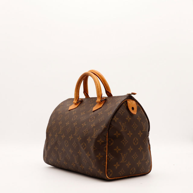 Vue trois quarts Louis Vuitton Speedy 30 toile Monogram marron — AMANA Vintage