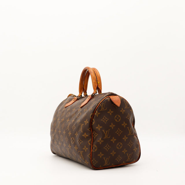 Louis Vuitton Speedy 30 vue de trois quarts droite toile Monogram occasion authentique — AMANA Vintage
