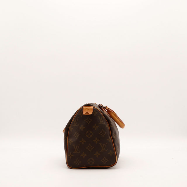 Vue de côté droit Louis Vuitton Speedy 25 tirette cadenas — AMANA Vintage