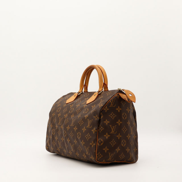 Louis Vuitton Speedy 30 vue trois quarts toile Monogram patine caramel occasion — AMANA Vintage
