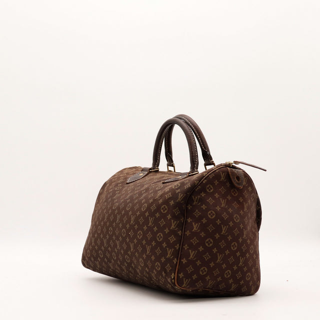 Vue de trois quarts Louis Vuitton Speedy 30 Mini Lin toile tissée marron — AMANA Vintage