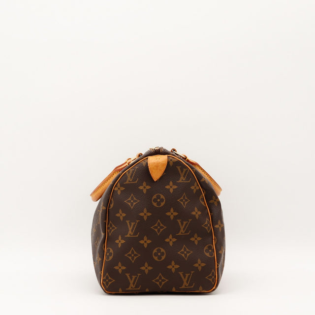 Détail de la fermeture Louis Vuitton Speedy 30 Toile Monogramme occasion authentique — AMANA Vintage