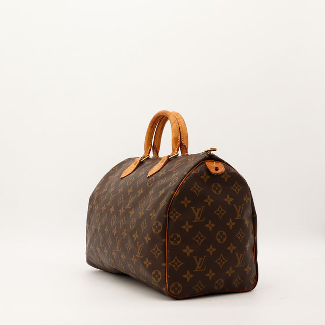 Vue de trois quarts Louis Vuitton Speedy 35 toile Monogram patine caramel — AMANA Vintage