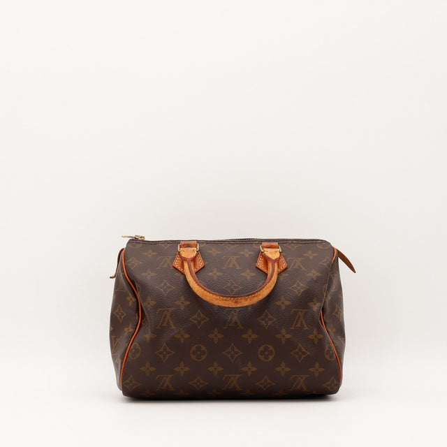Détail des anses Louis Vuitton Speedy 25 cuir vachette caramel occasion authentique — AMANA Vintage