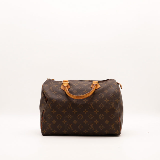 Louis Vuitton Speedy 30 vue de côté gauche avec languette cadenas — AMANA Vintage