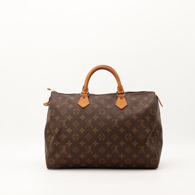 Vue de face Louis Vuitton Speedy 35 toile Monogram anses vachette — AMANA Vintage