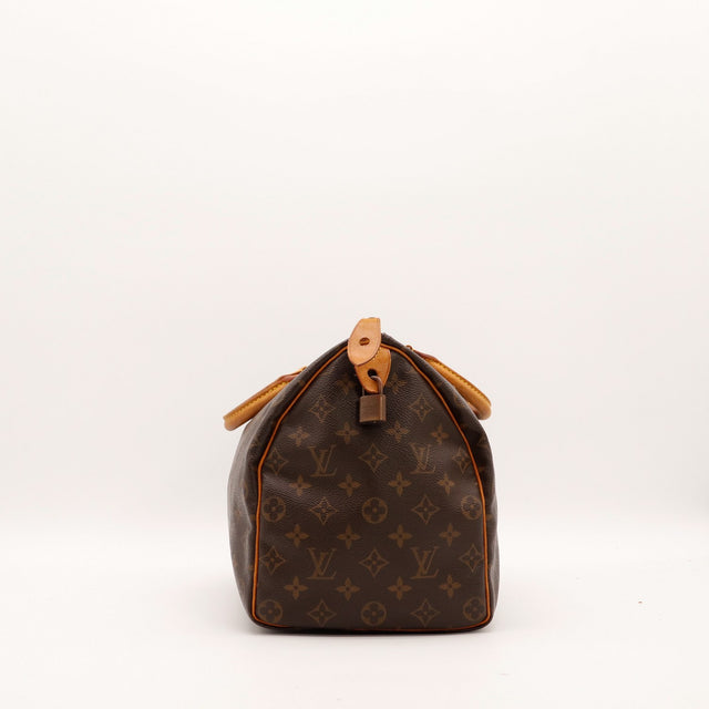 Vue de profil gauche Louis Vuitton Speedy 35 toile Monogram — AMANA Vintage