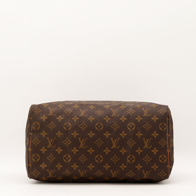 Détail des anses Louis Vuitton Speedy 30 cuir vachette occasion authentique — AMANA Vintage
