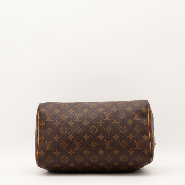 Détail de la tirette Louis Vuitton Speedy 30 Toile Monogramme occasion authentique — AMANA Vintage