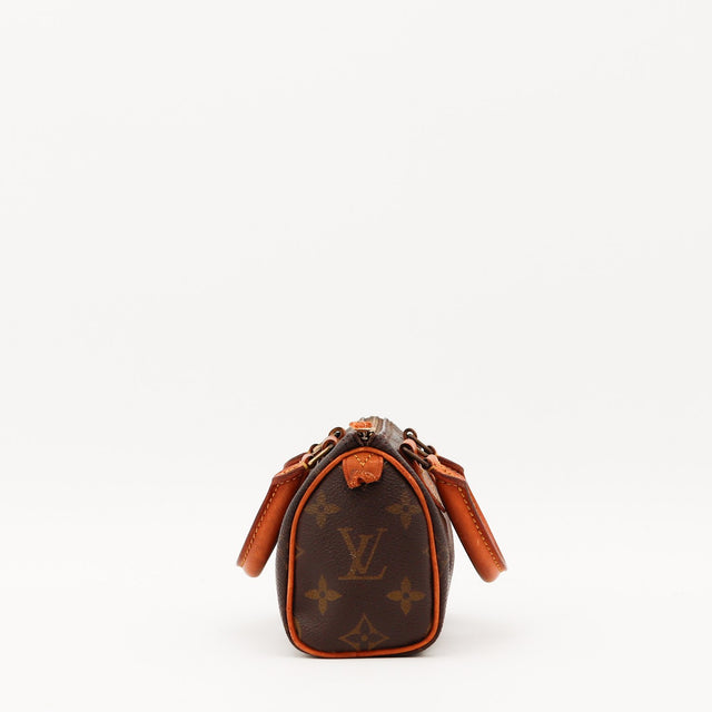 Vue de profil Louis Vuitton Mini Speedy Toile Monogramme occasion authentique — AMANA Vintage