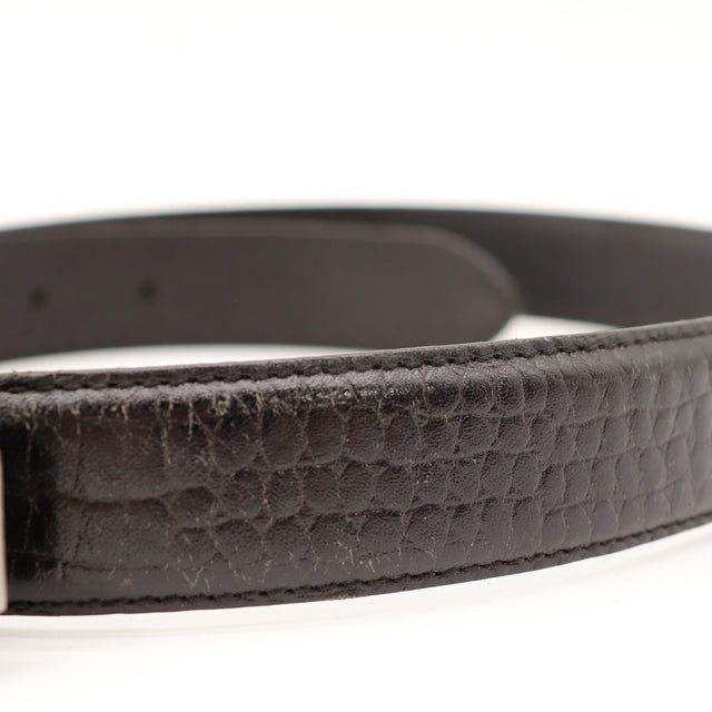 Détail cuir noir façon lézard ceinture Cartier occasion authentique — AMANA Vintage