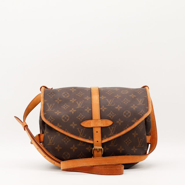 Vue de profil Louis Vuitton Saumur 30 Toile Monogramme occasion authentique — AMANA Vintage