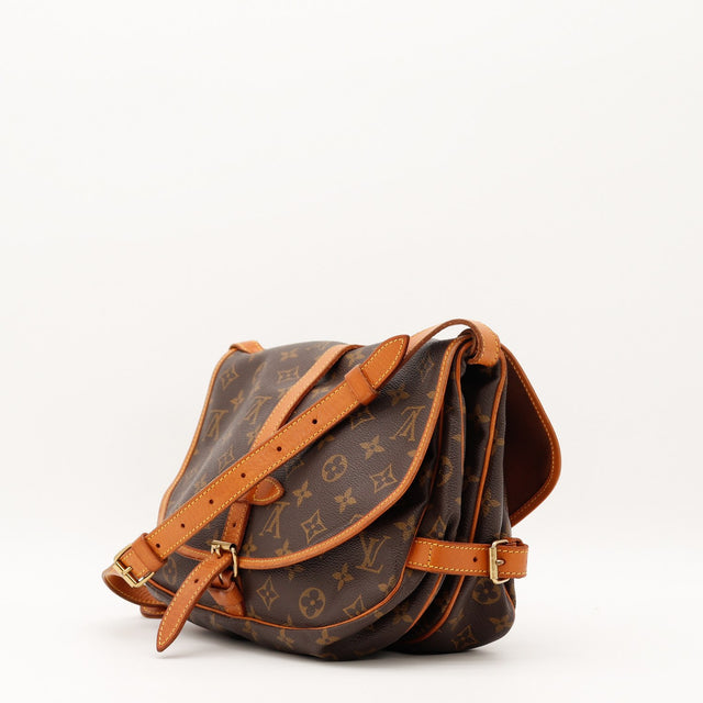 Vue de trois-quarts Louis Vuitton Saumur 30 Toile Monogramme occasion authentique — AMANA Vintage